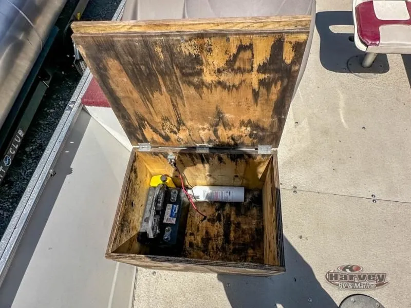 Slide: The Image of Open wooden box with battery and fire extinguisher on a boat. - 6