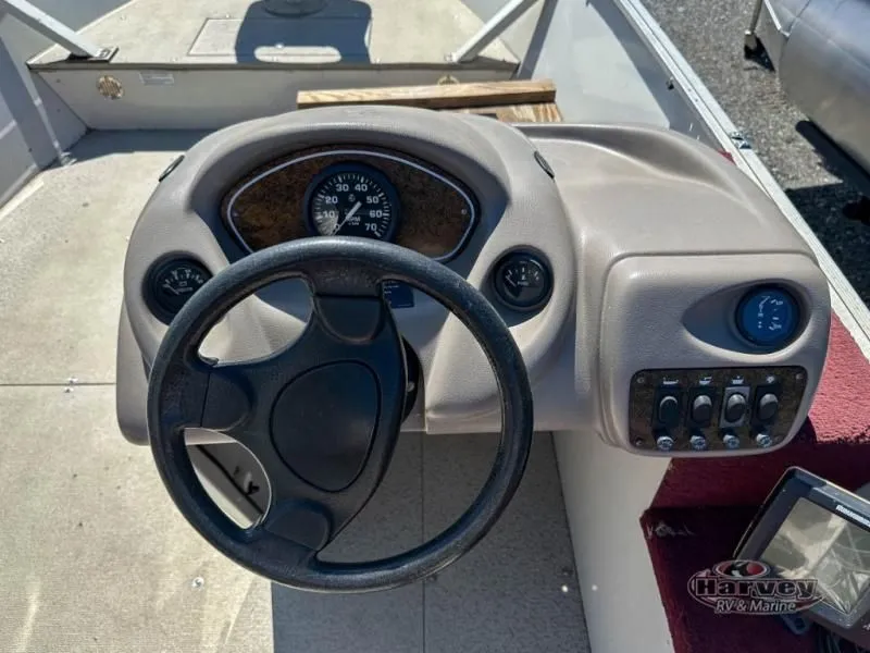 Slide: The Image of Steering wheel and dashboard of a 2002 Hudson 19 DLX. - 9
