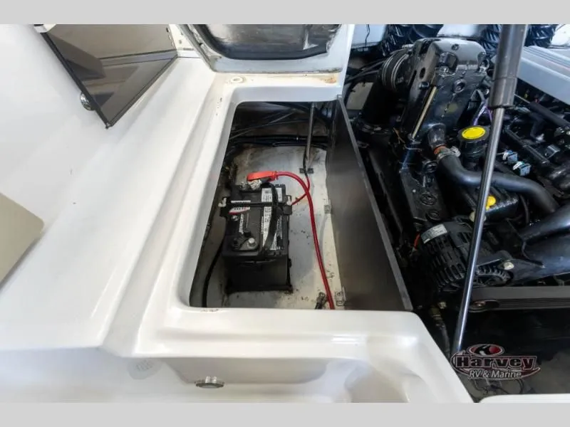 Slide: The Image of Regal 2000 boat engine compartment with battery, year 2014. - 10