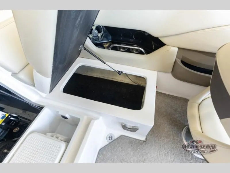 Slide: The Image of Interior of a 2014 Regal 2000 boat with storage compartment. - 12