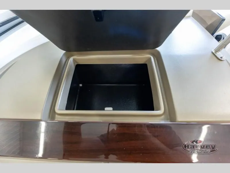 Slide: The Image of Open storage compartment on a 2014 Regal 2000 boat. - 14