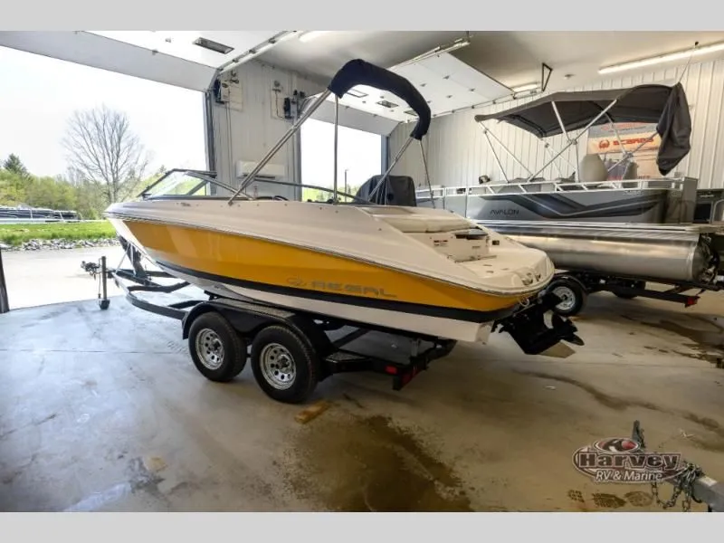 Slide: The Image of 2014 Regal 2000 boat on trailer in workshop. - 3