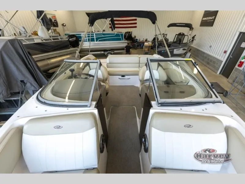 Slide: The Image of Interior view of a 2014 Regal 2000 boat in a workshop. - 8
