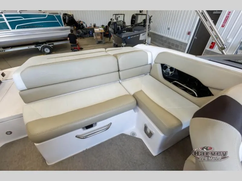 Slide: The Image of Interior of a 2014 Regal 2000 boat with beige seating. - 9