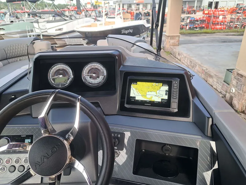 Slide: The Image of Avalon Catalina Quad Lounge Shift 2025 dashboard with Garmin navigation system. - 19
