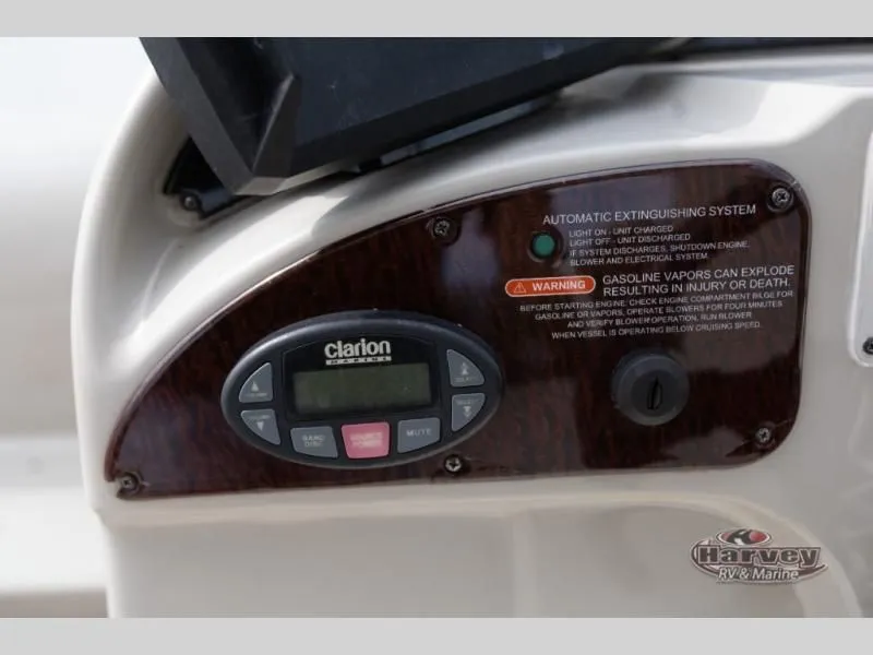 Slide: The Image of Control panel of 2005 SUNDANCER 260 boat with Clarion system. - 15