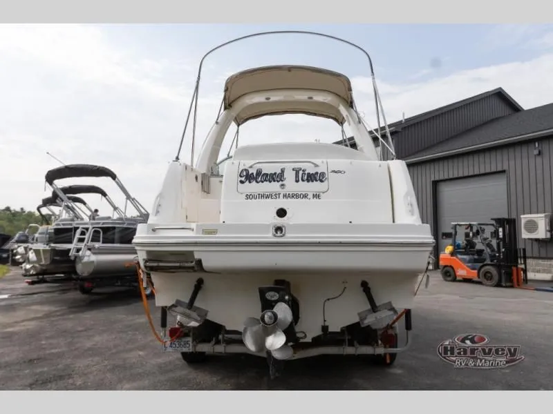 Slide: The Image of Rear view of a 2005 SUNDANCER 260 boat at the harbor. - 3
