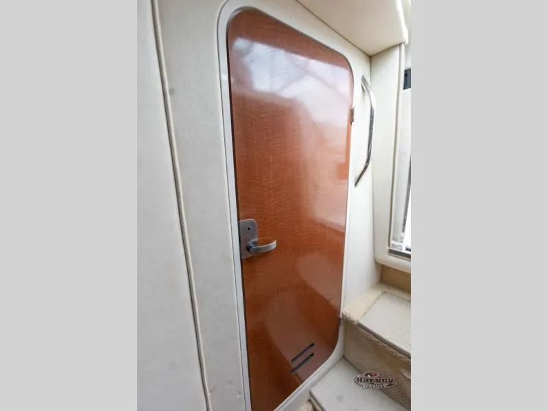 Slide: The Image of Interior door of a 2005 SUNDANCER 260 yacht. - 38