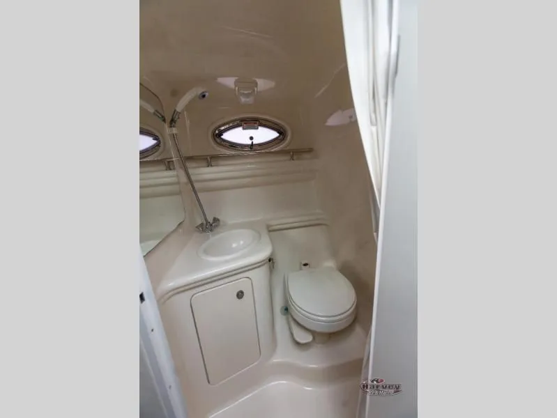 Slide: The Image of Interior of a SUNDANCER 260 yacht, bathroom with toilet and sink. - 39