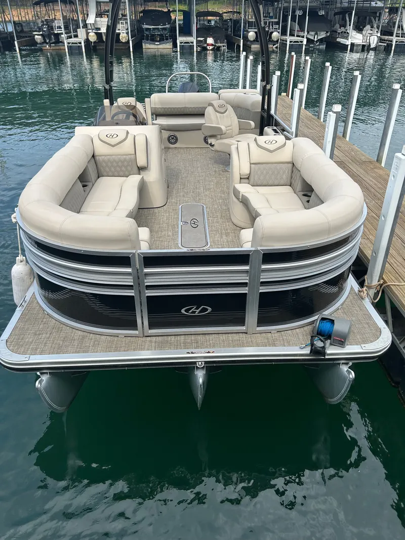Slide: The Image of 2020 Harris Sunliner 250 pontoon boat at dock. - 2