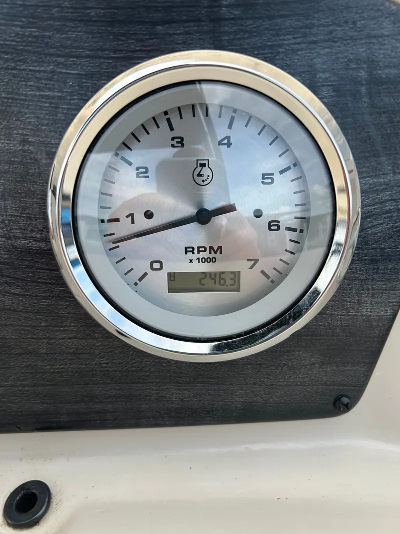 Slide: The Image of 2020 Harris Sunliner 250 tachometer displaying 2463 RPM. - 8