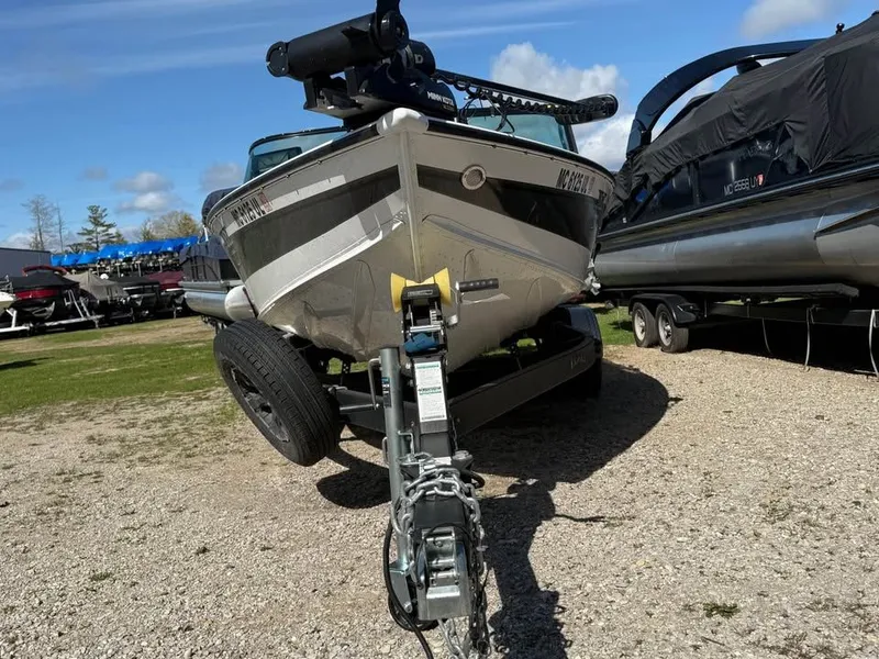 Slide: The Image of 2020 Lund 2175PROV boat parked on trailer outdoors. - 8