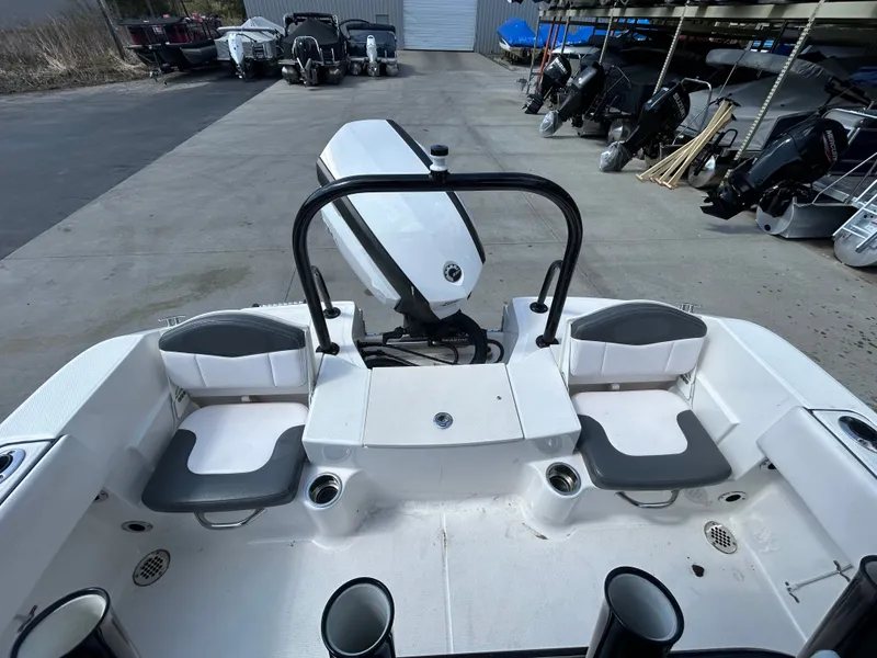 Slide: The Image of 2018 Robalo R180CC boat with seating and motor view. - 8