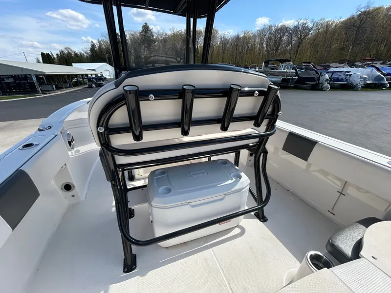 Slide: The Image of 2018 Robalo R180CC boat with seating and cooler. - 9