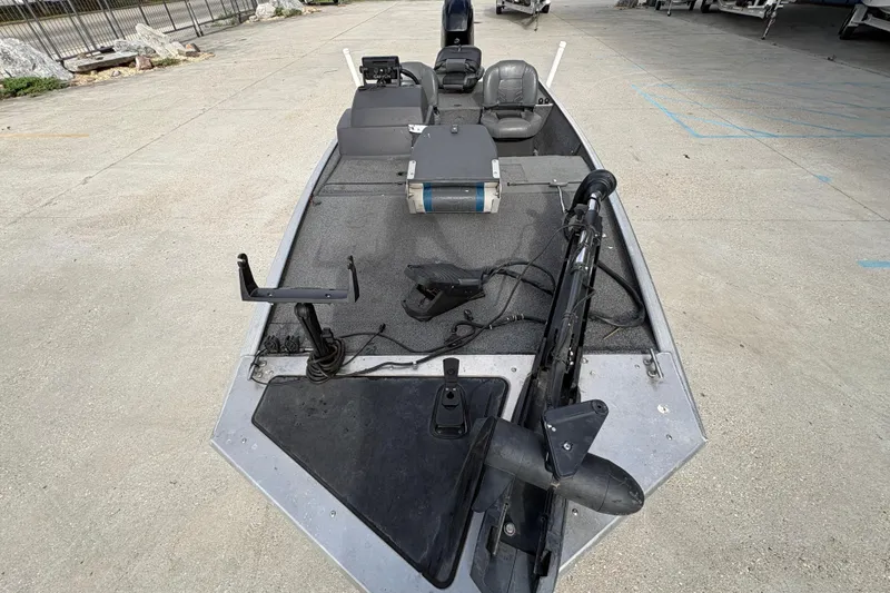 Slide: The Image of 2020 Tracker Bass Tracker Classic XL boat interior with fishing equipment and seating. - 10