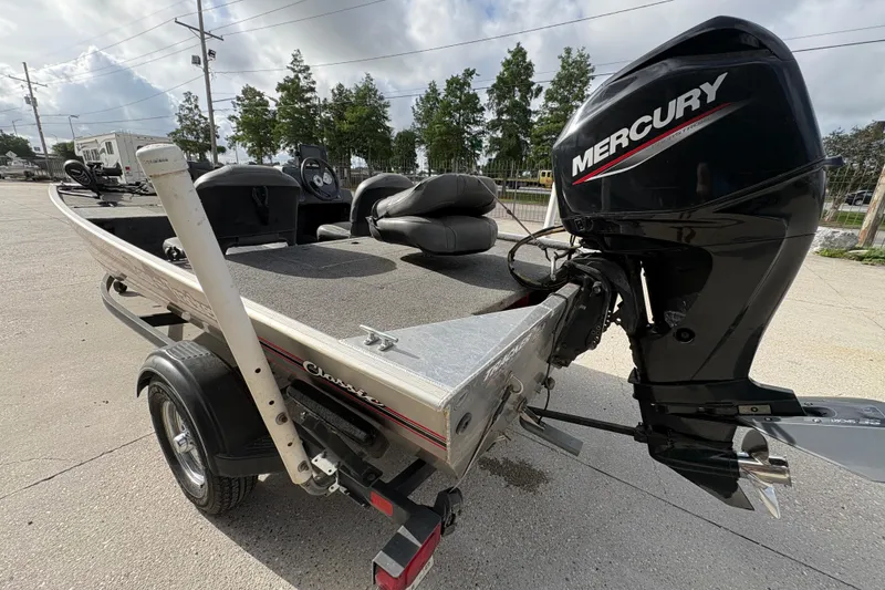 Slide: The Image of 2020 Tracker Bass Tracker Classic XL boat with Mercury outboard motor on trailer. - 5