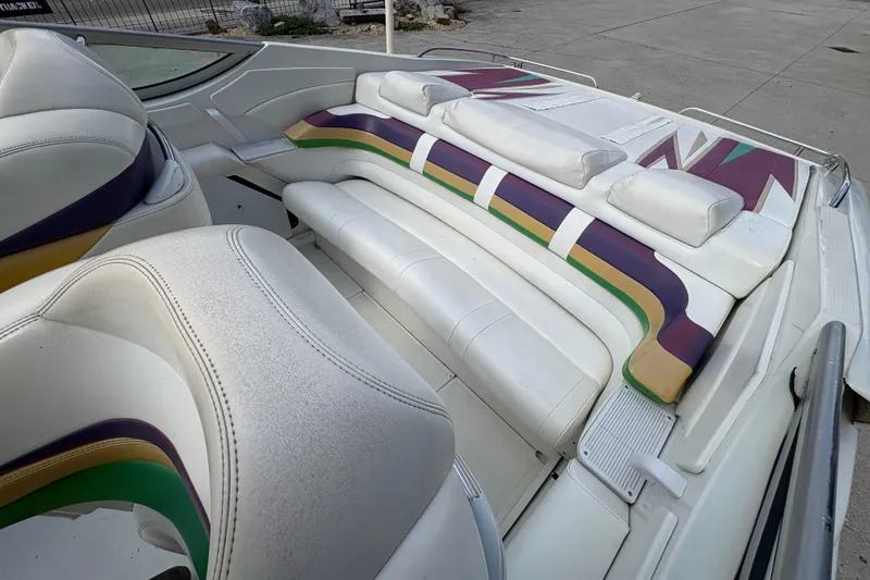 Slide: The Image of 2002 Formula 292 FASTech boat interior with colorful seating design. - 14