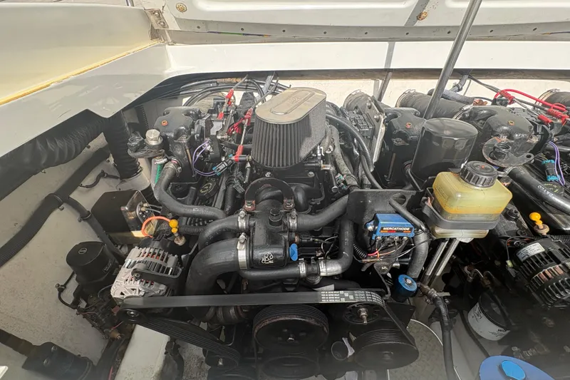Slide: The Image of Engine compartment of a 2002 Formula 292 FASTech boat, showcasing detailed components. - 28
