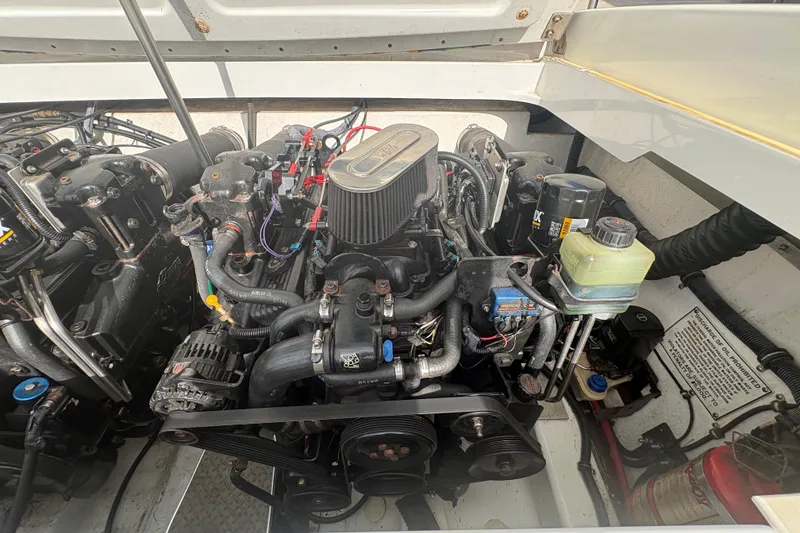 Slide: The Image of Engine compartment of a 2002 Formula 292 FASTech boat, showcasing detailed mechanical components. - 29