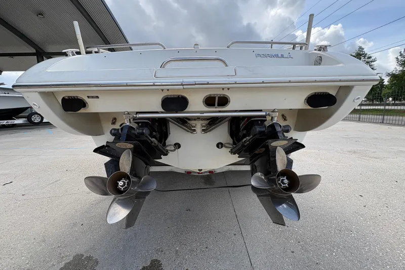 Slide: The Image of Rear view of a 2002 Formula 292 FASTech boat with dual propellers. - 5