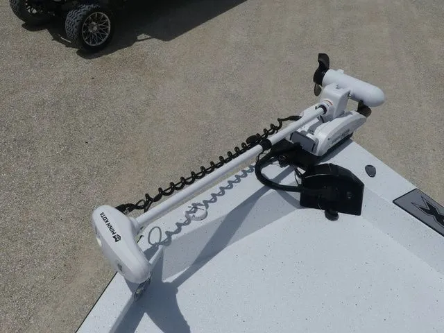 Slide: The Image of 2026 Xpress Hyper-Lift H24B boat with Minn Kota trolling motor. - 12