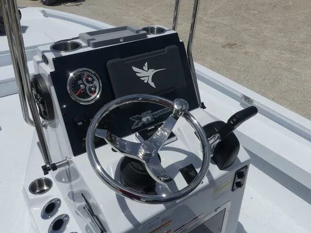 Slide: The Image of Steering console of Xpress Hyper-Lift H24B boat, year 2026. - 15