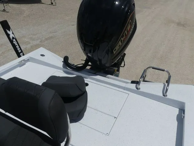 Slide: The Image of 2026 Xpress Hyper-Lift H24B boat with outboard motor. - 16