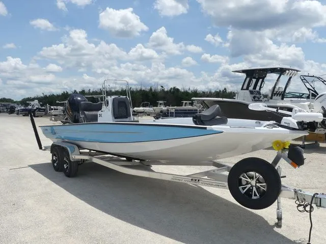 Slide: The Image of 2026 Xpress Hyper-Lift H24B boat on trailer outdoors. - 3