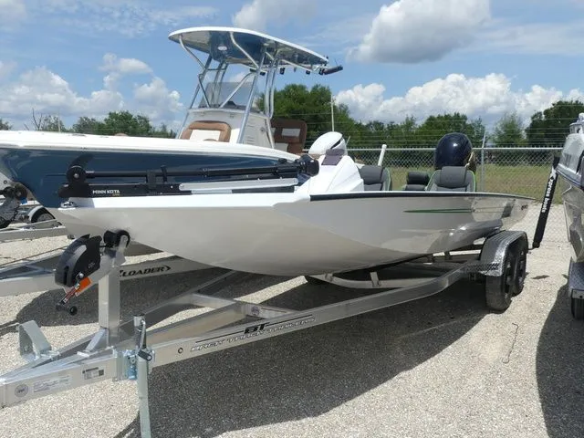 The Image of 2026 Xpress Hyper Lift H20B boat on trailer outdoors. - 1