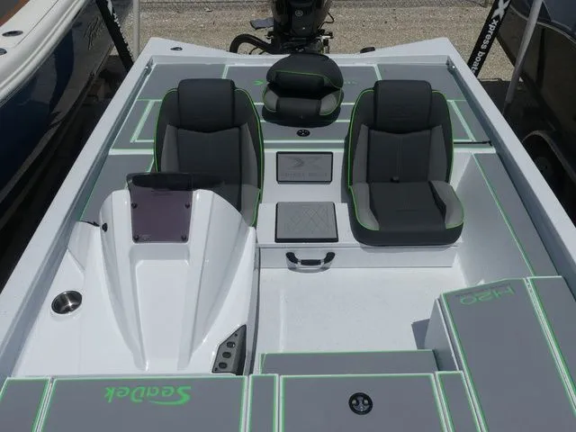 Slide: The Image of Interior of 2026 Xpress Hyper Lift H20B boat with modern seating. - 13