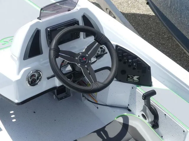 Slide: The Image of Steering console of the 2026 Xpress Hyper Lift H20B boat. - 16