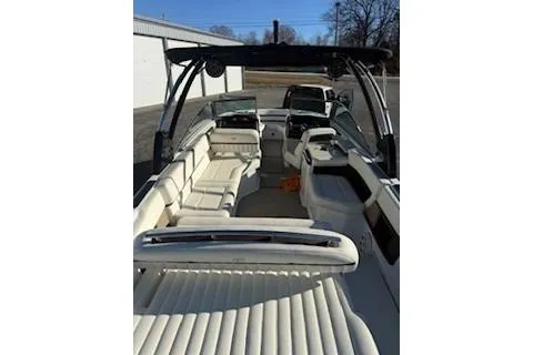 Slide: The Image of 2018 Cobalt A28 boat interior with white seating and sleek design. - 11