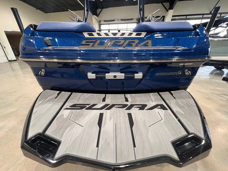 Slide: The Image of 2021 Supra SL 400 boat with SwellSurf technology, rear view. - 14