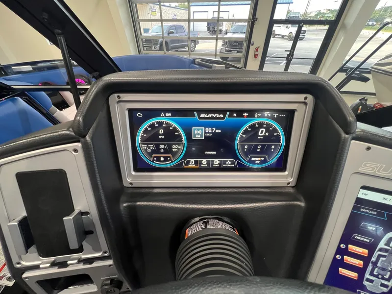 Slide: The Image of 2021 Supra SL 400 dashboard with digital display. - 26