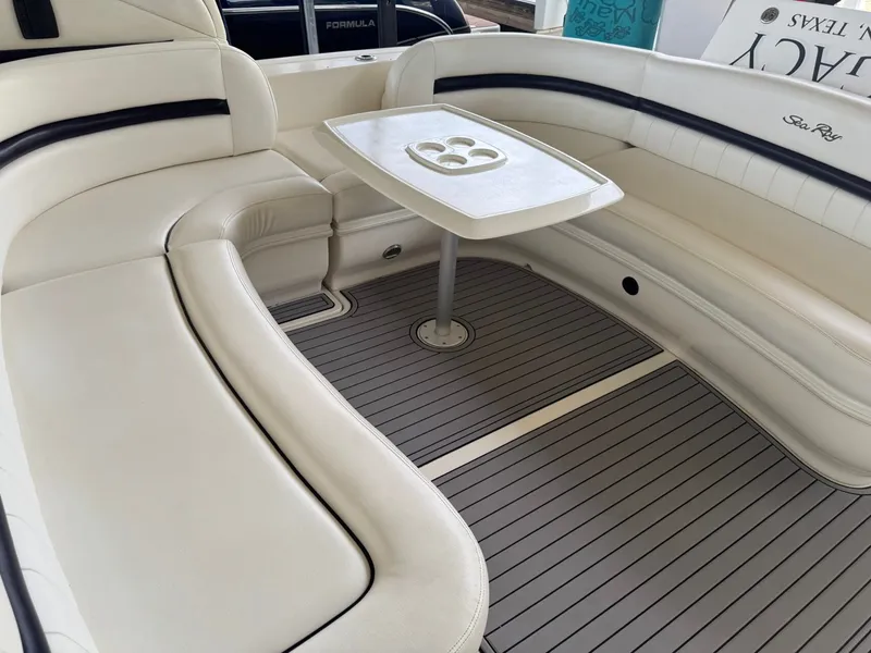 Slide: The Image of Interior of a 2008 Sea Ray 44 Sundancer with cream seating. - 10