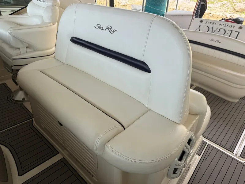 Slide: The Image of Interior of a 2008 Sea Ray 44 Sundancer with white leather seating. - 12