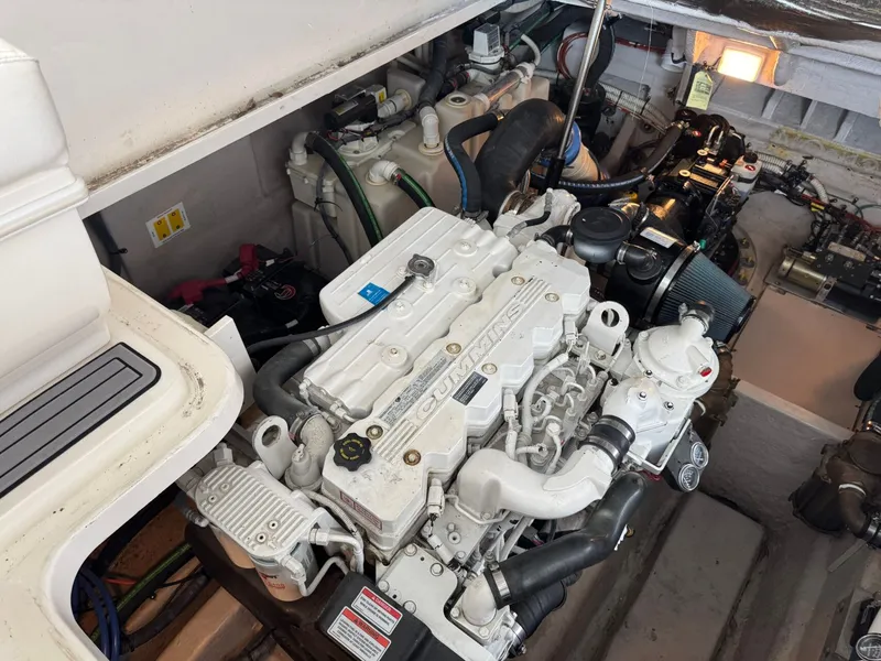 Slide: The Image of Engine room of a 2008 Sea Ray 44 Sundancer boat with Cummins engine. - 14