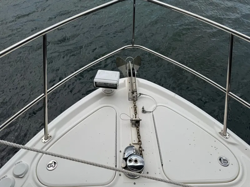 Slide: The Image of Bow view of 2008 Sea Ray 44 Sundancer on water. - 19