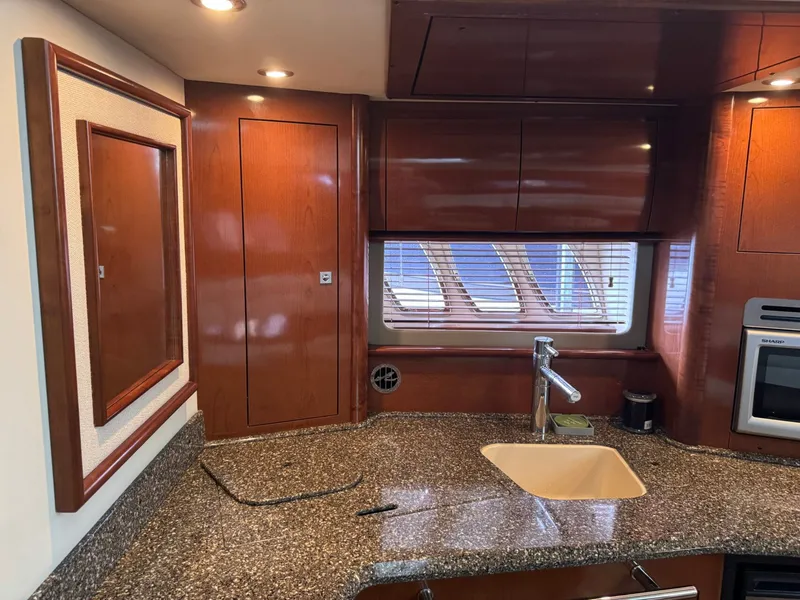Slide: The Image of Interior of 2008 Sea Ray 44 Sundancer with modern kitchen. - 28