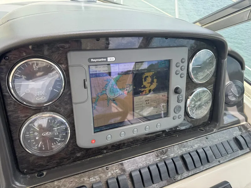 Slide: The Image of Dashboard of 2008 Sea Ray 44 Sundancer with navigation system. - 4