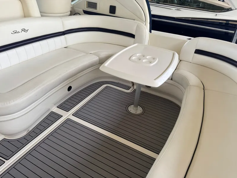 Slide: The Image of Interior of a 2008 Sea Ray 44 Sundancer with white upholstery. - 9