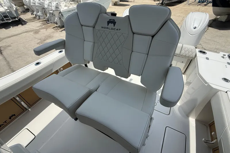 Slide: The Image of Luxury seating on 2026 World Cat 265 CC-X boat, featuring premium upholstery and armrests. - 10
