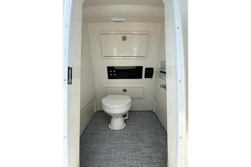 Slide: The Image of Interior of 2026 World Cat 265 CC-X boat bathroom with modern fixtures. - 16