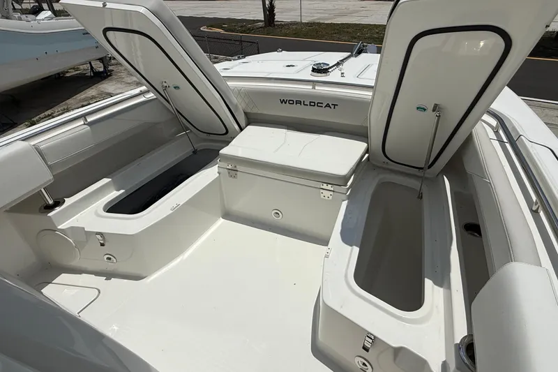 Slide: The Image of 2026 World Cat 265 CC-X boat interior with open storage compartments. - 18