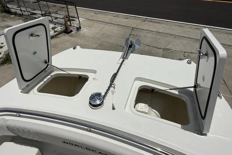 Slide: The Image of Open storage compartments on 2026 World Cat 265 CC-X boat deck. - 20