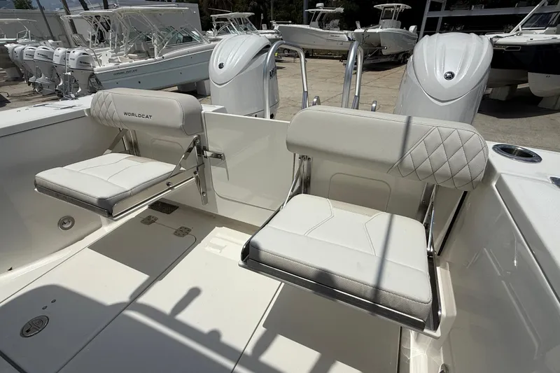 Slide: The Image of 2026 World Cat 265 CC-X boat seats with elegant white upholstery and diamond stitching. - 7