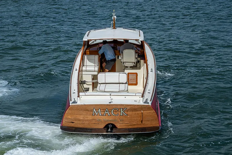Slide: The Image of Hinckley Picnic Boat 36 Classic, 1996 model, cruising on open water. - 5
