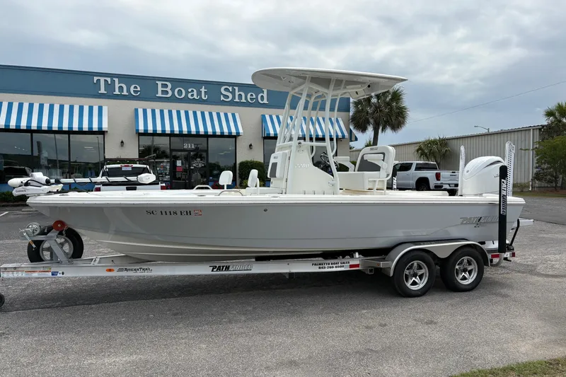 The Image of 2025 Pathfinder 2200 TRS boat on trailer outside The Boat Shed dealership. - 0