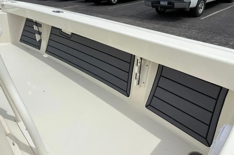 Slide: The Image of 2025 Pathfinder 2200 TRS boat interior with sleek storage compartments. - 15