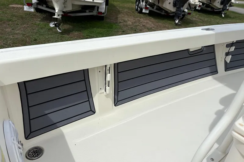 Slide: The Image of 2025 Pathfinder 2200 TRS boat interior with sleek storage compartments. - 16